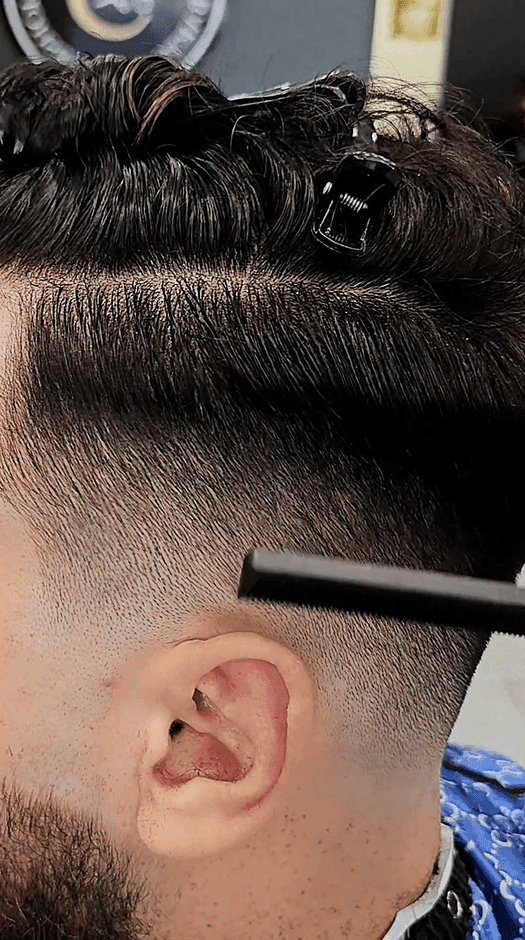 Student receiving free cut