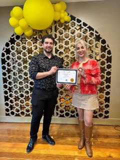 Harry.M providing one-on-one feedback to a student during a practical session