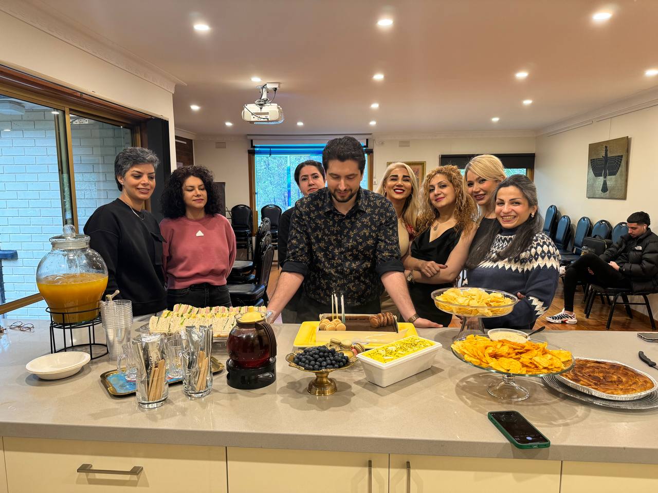 Harry.M providing one-on-one feedback to a student during a practical session